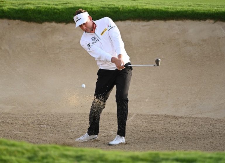 Ian Poulter Photo by Ross Kinnaird/Getty Images