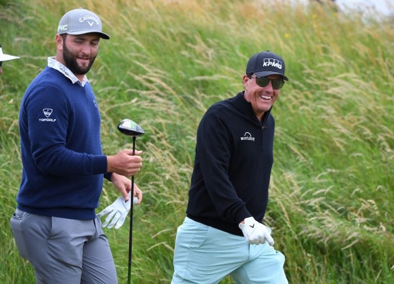 Phil Mickelson Jon Rahm Photo by ANDY BUCHANAN / AFP