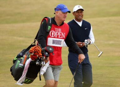 Tiger Woods Joe LaCava Photo by Andrew Redington/Getty Images