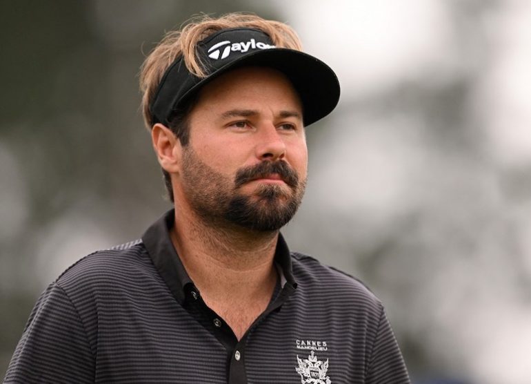 Victor Dubuisson Photograph by ROSS KINNAIRD / GETTY IMAGES EUROPE / Getty Images via AFP