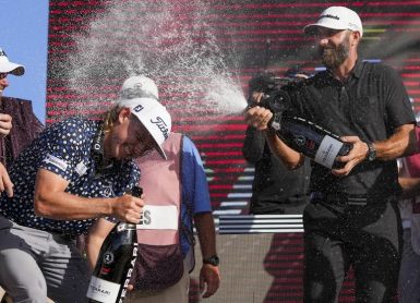 Dustin Johnson 4 Aces Eric Espada/Getty Images/AFP