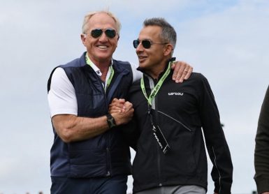 Greg Norman Atul Khosla Photo by Adrian DENNIS / AFP