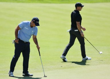 rory-mcilroy-patrick-reed.jpg Andy Lyons/Getty Images/AFP