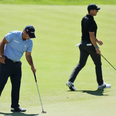 rory-mcilroy-patrick-reed.jpg Andy Lyons/Getty Images/AFP