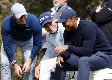 Rory McIlroy Justin Thomas Tiger Woods Photo by Michael Owens / GETTY IMAGES NORTH AMERICA / Getty Images via AFP