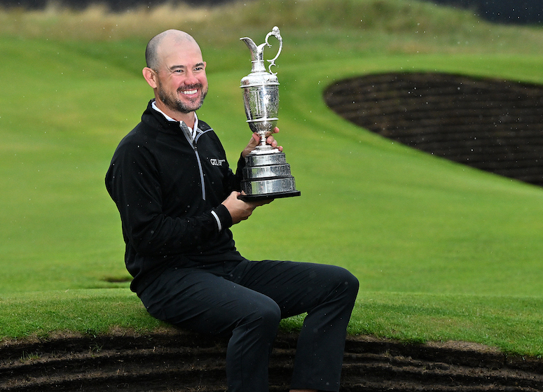 US golfer Brian Harman Claret Jug Photo by Glyn KIRK / AFP