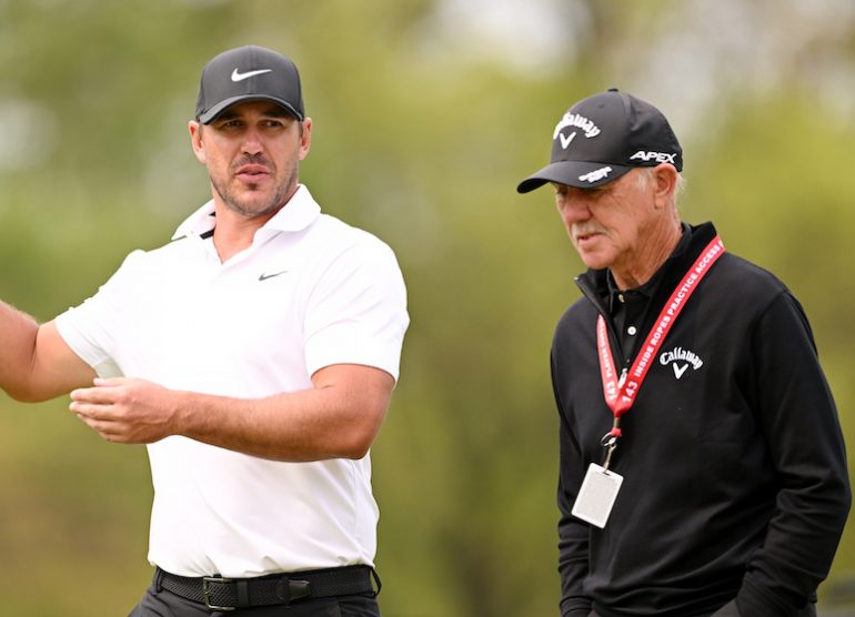 Brooks Koepka Coach Pete Cowen Photo by Ross Kinnaird/Getty Images