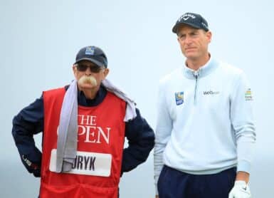 Jim Furyk MIKE COWAN FLUFFY FLUFF caddie Photo by Andrew Redington/Getty Images