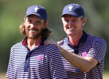 Tommy Fleetwood and Justin Rose Photo by Andrew Redington/Getty Images
