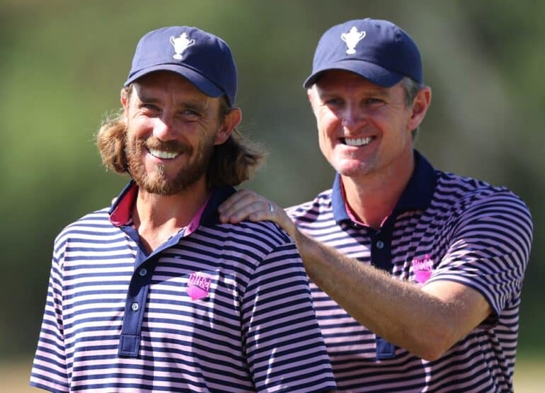 Tommy Fleetwood and Justin Rose Photo by Andrew Redington/Getty Images