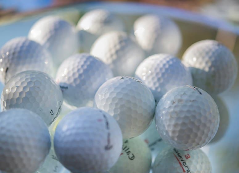 Balles de golf Photo de Cristina Anne Costello sur Unsplash