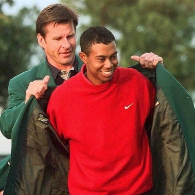 Tiger Woods Nick Faldo Photo by JEFF HAYNES / AFP