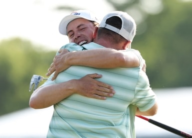 Matt Fitzpatrick (L) of England and partner Alex Fitzpatrick Stacy Revere/Getty Images/AFP
