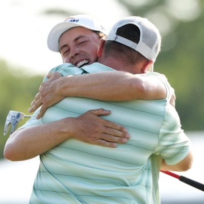 Matt Fitzpatrick (L) of England and partner Alex Fitzpatrick Stacy Revere/Getty Images/AFP
