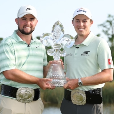 Matt Fitzpatrick (L) of England and partner Alex Fitzpatrick Stacy Revere/Getty Images/AFP