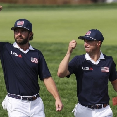 Cameron Young and Justin Thomas Photo by Andrew Redington / GETTY IMAGES NORTH AMERICA / Getty Images via AFP