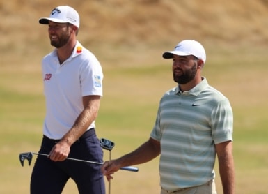 US golfer Sam Burns (L) and US golfer Scottie Scheffler (R) Photo by Adrian Dennis / AFP)
