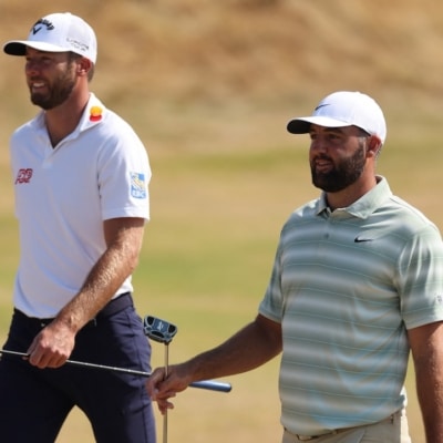 US golfer Sam Burns (L) and US golfer Scottie Scheffler (R) Photo by Adrian Dennis / AFP)