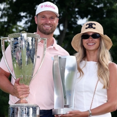 Wyndham Clark of the United States and girlfriend Emily Tanner Photo by Kevin C. Cox / GETTY IMAGES NORTH AMERICA / Getty Images via AF